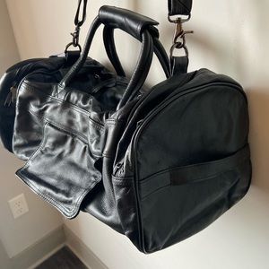 Brand new black leather duffel